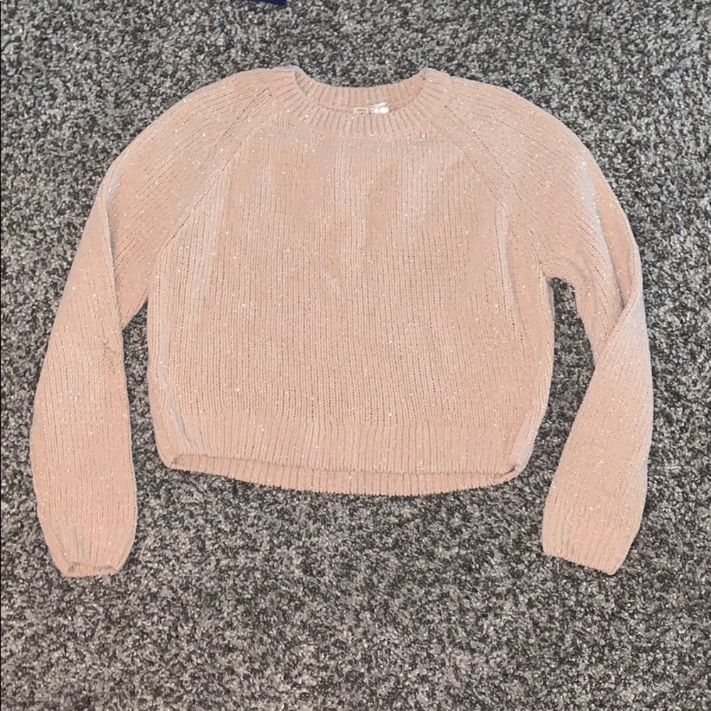 A shiny sweater